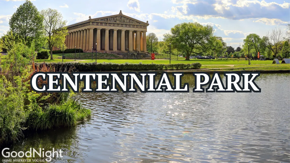 The image features a stunning view of The Parthenon in Centennial Park, surrounded by calm water, lush greenery, and walking paths. The setting is peaceful, inviting families to enjoy outdoor activities such as picnicking, walking, or boating, with plenty of open space for children to play and explore. The Parthenon-like structure ties directly to Nashville's iconic attractions mentioned in the text.
